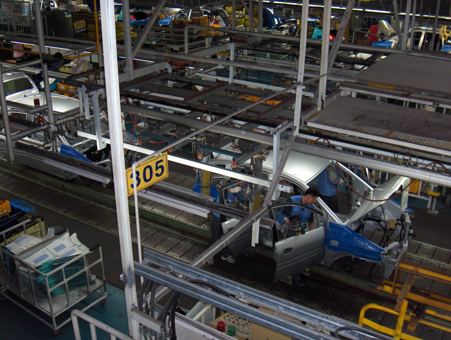 Car assembly line in an automotive factory